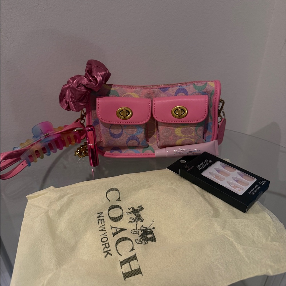 Coach Pink Multicolor Signature Wristlet with Gold-Tone Hardware